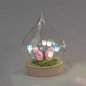 Preview: Deko-Kugel 14 cm mehrfarbig auf Holzsockel Blumendeko mit LED-Licht Glas 816627 formano
